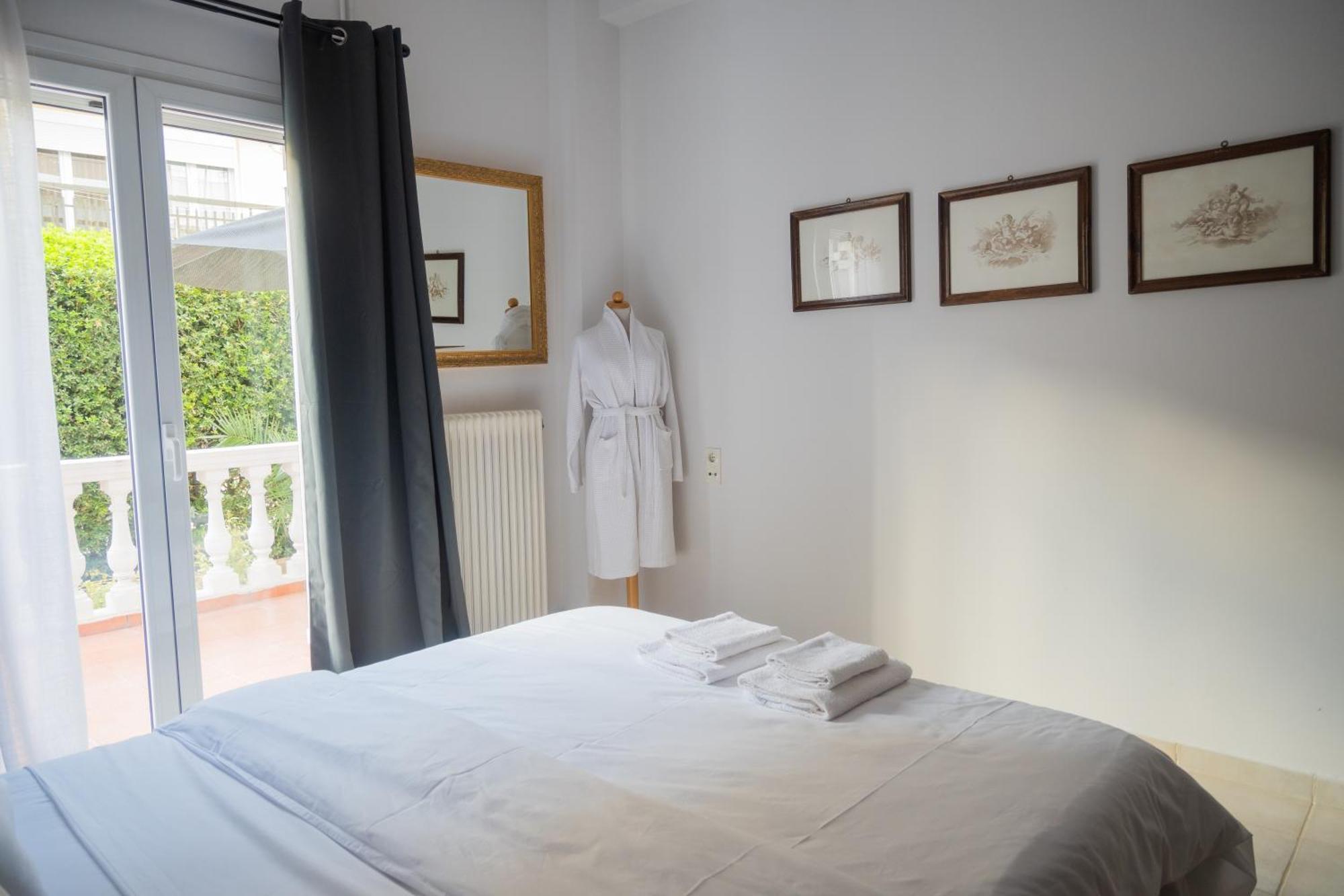 Apartment μονοκατοικία με κήπο στη θάλασσα.